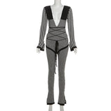 Bonnyshow new autumn and winter women's sexy deep V-neck striped contrasting color slim-fit strapped long-sleeved knitted jumpsuit