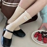 Bonnyshow Korean Cotton Ruffles Middle Tube Socks for Women Solid Color Label Pile up Socks Japanese Lolita Girl Accessories New year gift