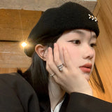 Bonnyshow Korean Woolen Berets for Women British Vintage Metal Label Girls Newsboy Cap Autumn Winter Warm Tweed Painter Caps