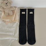 Bonnyshow Korean Cotton Ruffles Middle Tube Socks for Women Solid Color Label Pile up Socks Japanese Lolita Girl Accessories New year gift