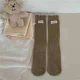 Bonnyshow Korean Cotton Ruffles Middle Tube Socks for Women Solid Color Label Pile up Socks Japanese Lolita Girl Accessories New year gift