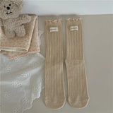 Bonnyshow Korean Cotton Ruffles Middle Tube Socks for Women Solid Color Label Pile up Socks Japanese Lolita Girl Accessories New year gift