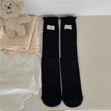 Bonnyshow Korean Cotton Ruffles Middle Tube Socks for Women Solid Color Label Pile up Socks Japanese Lolita Girl Accessories New year gift