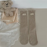 Bonnyshow Korean Cotton Ruffles Middle Tube Socks for Women Solid Color Label Pile up Socks Japanese Lolita Girl Accessories New year gift